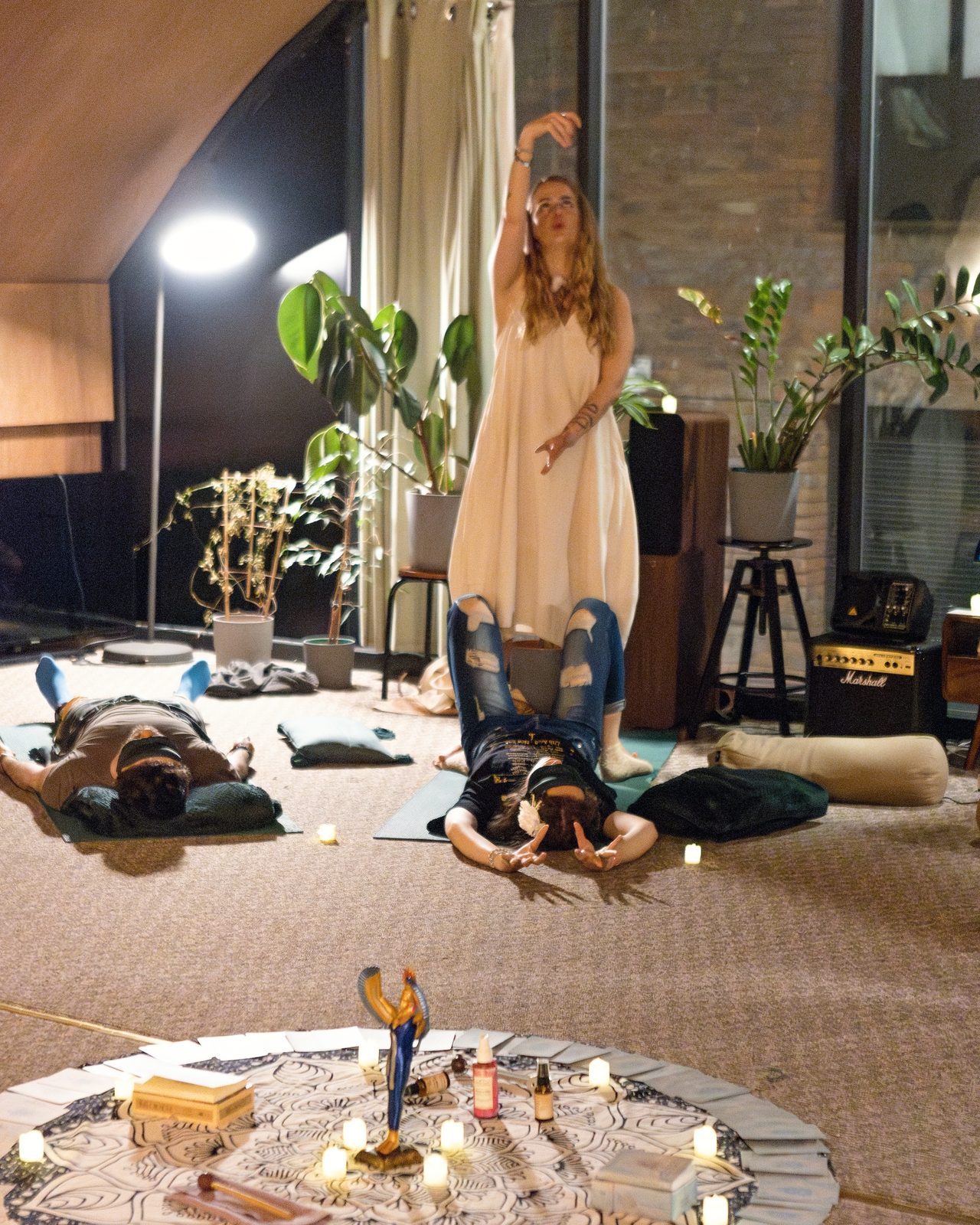 The ceremony room with participants lying around the altar