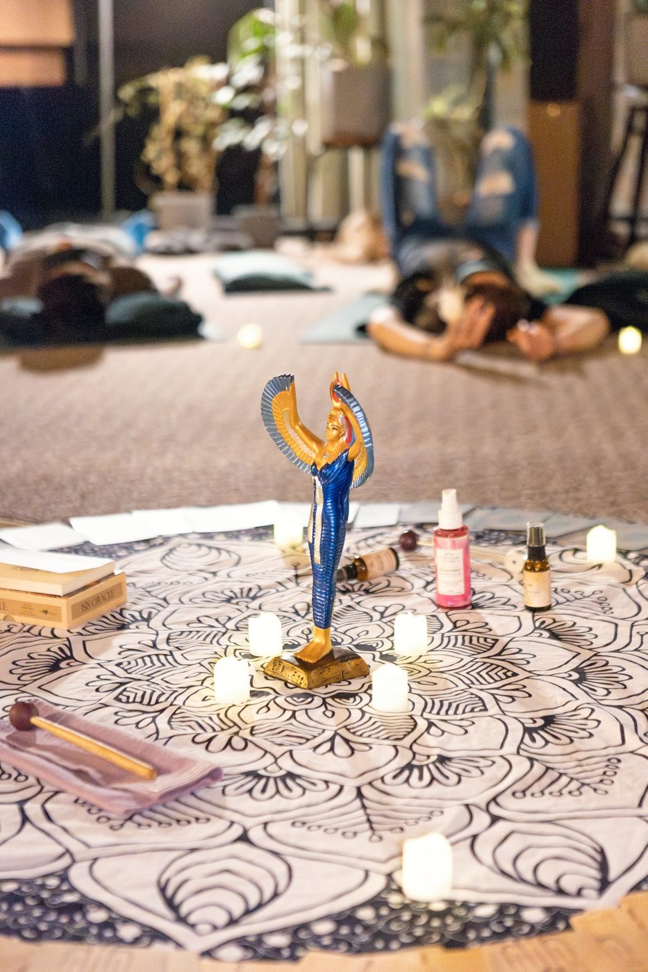 The candlelit altar laid out at the centre of the room